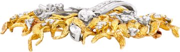 Floral Brooch with baguette, marquise, round, pear, and trillion diamonds
