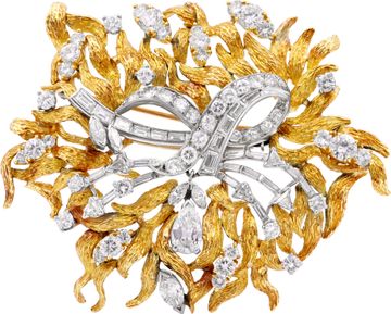 Floral Brooch with baguette, marquise, round, pear, and trillion shaped diamonds in 18k yellow and white gold Jewelry Collection