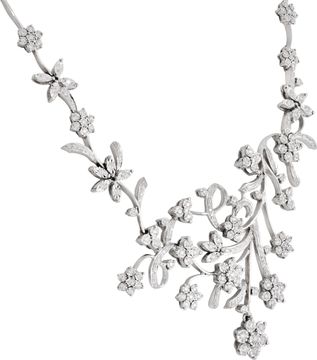 Floral cluster diamond necklace and earrings in 18k white gold Illusion set