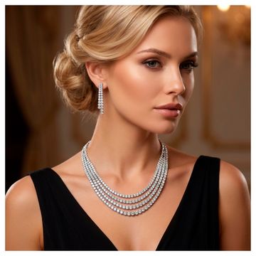 Four strand draping diamond necklace and dangling earring set in 18k white gold.
