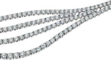 Four strand draping diamond necklace and dangling earring set in 18k white gold.