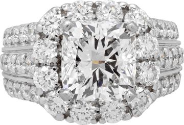 GIA Certified 3.02 carat cushion cut diamond ring in 18k white gold.