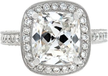 GIA certified Cushion Cut 5.17ct. G - SI2.   Halo ring 18k white gold. Size 7