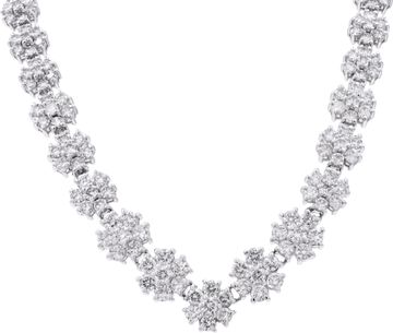 Platinum 6.00 carats diamonds graduating flower line necklace.