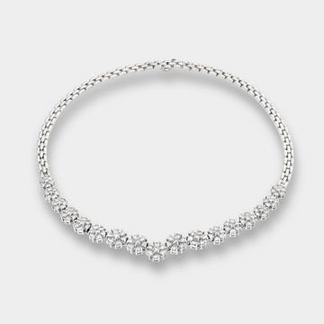 Platinum 6.00 carats diamonds graduating flower line necklace.