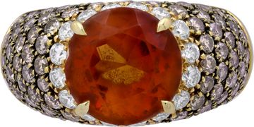 Imperial Orange Topaz ring in 18k yellow gold with white and champagne diamonds