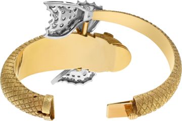 Koi Fish bangle in 18k yellow gold with 1 carat in diamonds.
