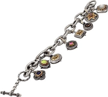 Charm Bracelet in sterling silver and 18k yellow gold.
