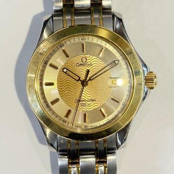 Omega Seamaster Aqua Terra 2311.11.00 Steel & Yellow Gold Champagne dial 36mm Quartz
