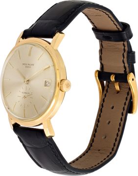 Patek Philippe Calatrava in 18k yellow gold with a cream dial with sub seconds