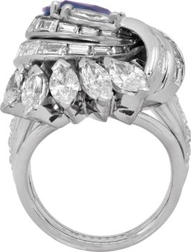 Pear Shape Sapphire and Diamond Ring in platinum with a geometric design