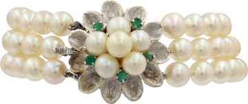Pearl bracelet with 14k white gold clasp with with pearl andemerald accents