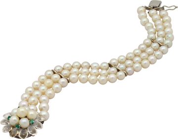 Pearl bracelet with 14k white gold clasp with with pearl andemerald accents