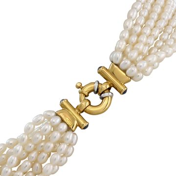 Pearl necklace with a 18k yellow gold calsp