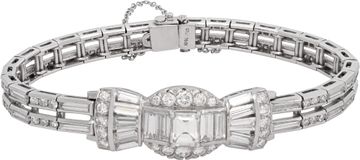 Platinum bracelet set with round, emerald, tapered baguette, and baguette-cut diamonds totaling approximately 5.00 carats Platinum bracelet set with round, emerald, tapered baguette, and baguette-cut diamonds totaling approximately 5.00 carats Bracelet Collection