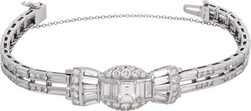 Platinum bracelet set with round, emerald, tapered baguette, and baguette-cut diamonds totaling approximately 5.00 carats