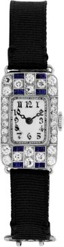 Platinum cocktail watch with diamonds and blue sapphires Platinum cocktail watch with diamonds and blue sapphires Jewelry Collection