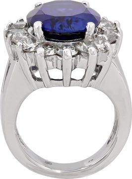 Platinum ring featuring a striking large oval-cut synthetic sapphire