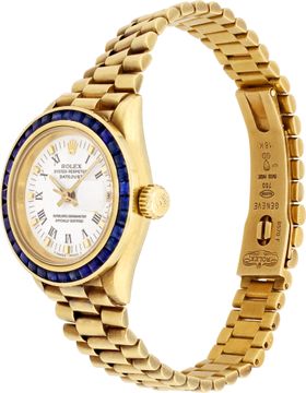 Ladies Rolex Datjust in 18k yellow gold with custom blue sapphire bezel