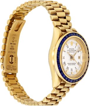Ladies Rolex Datjust in 18k yellow gold with custom blue sapphire bezel