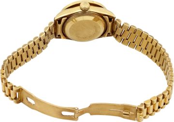 Ladies Rolex Datjust in 18k yellow gold with custom blue sapphire bezel