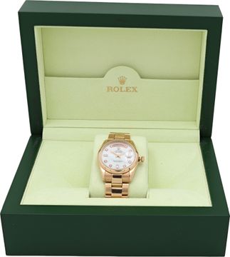 Rolex Date-Date in 18k rose gold with custom MOP diamond dial
