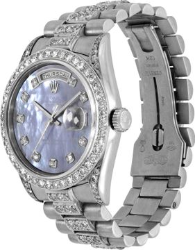 Rolex Day-Date in 18k white gold with a diamond bracelet,bezel, and lugs