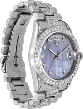 Rolex Day-Date in 18k white gold with a diamond bracelet,bezel, and lugs