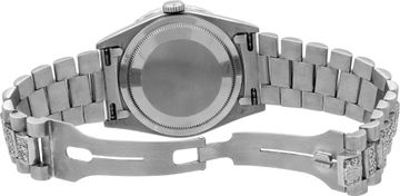 Rolex Day-Date in 18k white gold with a diamond bracelet,bezel, and lugs