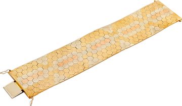 Striking vintage bracelet crafted in 18k yellow, white, and rose gold