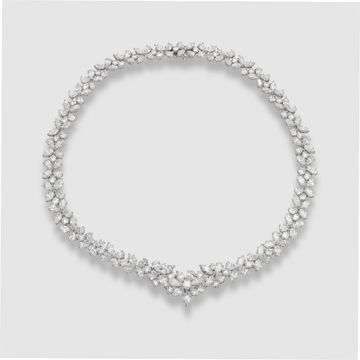 Stunning diamond necklace in 18k white gold. Floral mosaic of Marquise, Pear and Round Brilliant cut Diamonds, total approx. weight: 50.00 carats 17.00 inches long.