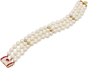 Three-row cultured pearl bracelet with 14k gold clasp.