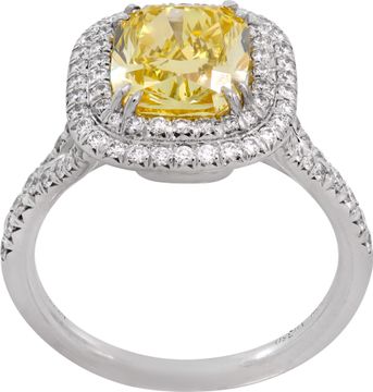 Tiffany & Co. 2.51 carat Fancy Vivid Yellow Halo Ring in 18k gold and platinum. Diamond is 2.51 carats and is VS2 clarity. Ring Collection