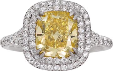 Tiffany & Co. 2.51 carat Fancy Vivid Yellow Halo Ring in 18k gold and platinum. Diamond is 2.51 carats and is VS2 clarity.