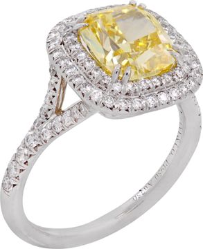 Tiffany & Co. 2.51 carat Fancy Vivid Yellow Halo Ring in 18k gold and platinum. Diamond is 2.51 carats and is VS2 clarity.