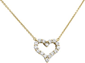 Tiffany & Co diamond small heart pendant in 18k yellow gold with approximately 0.80 carats in round diamonds.