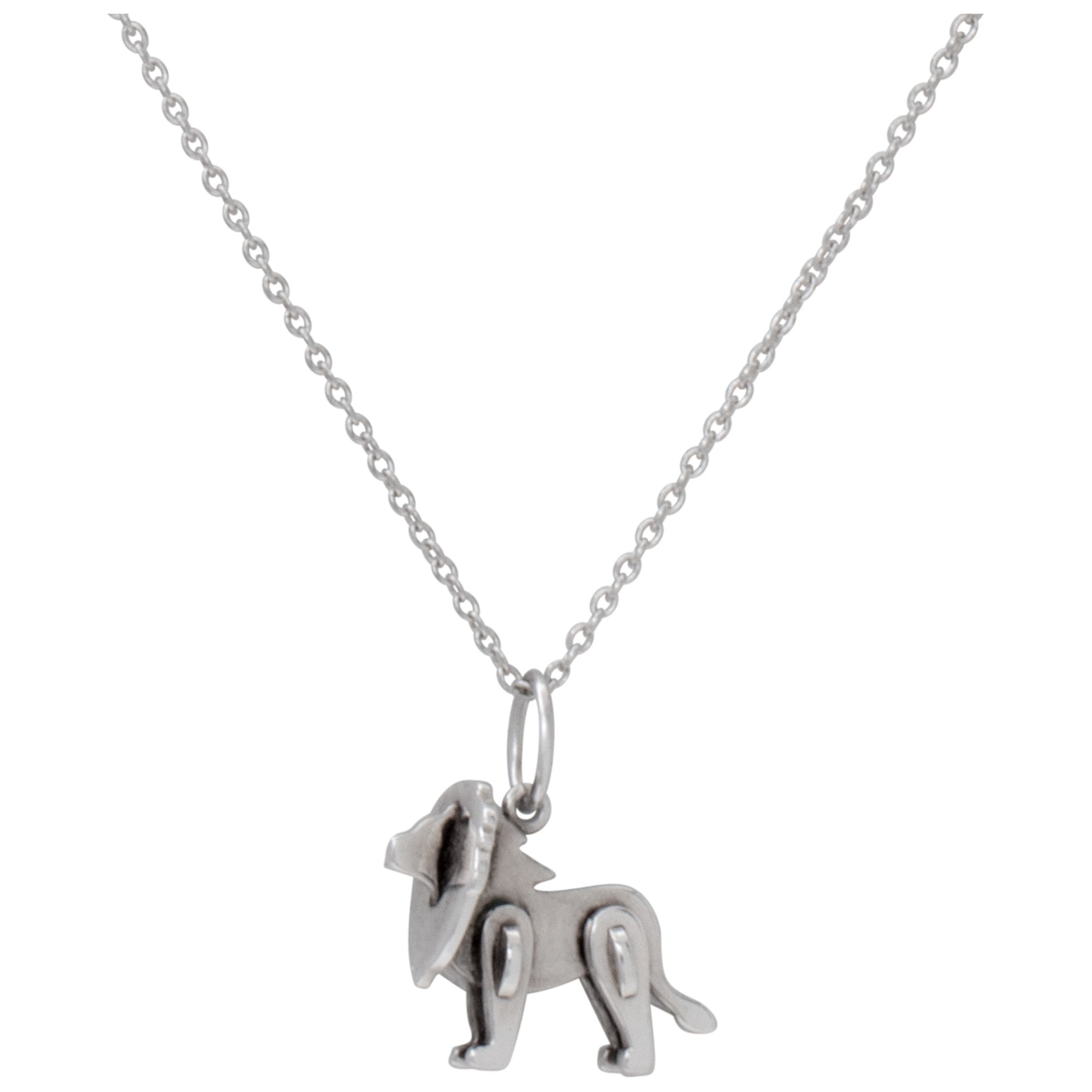 Tiffany & Co. silver necklace set with lion pendant. | Gray & Sons
