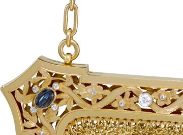 Vintage evening handbag in 18k yellow gold diamonds and cabochon sapphires