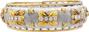 White and yellow gold diamond bangle in 18k