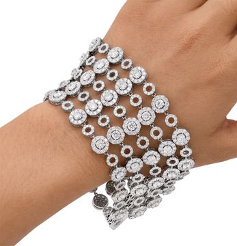 Wide multi-row diamond bracelet in 18k white gold with articulating circular links. Over 37 carats in round diamonds Wide multi-row diamond bracelet in 18k white gold with articulating circular links. Over 37 carats in round diamonds Bracelet Collection