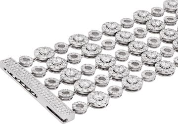 Wide multi-row diamond bracelet in 18k white gold with articulating circular links. Over 37 carats in round diamonds