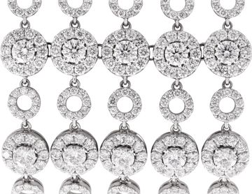 Wide multi-row diamond bracelet in 18k white gold with articulating circular links. Over 37 carats in round diamonds