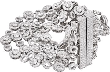 Wide multi-row diamond bracelet in 18k white gold with articulating circular links. Over 37 carats in round diamonds